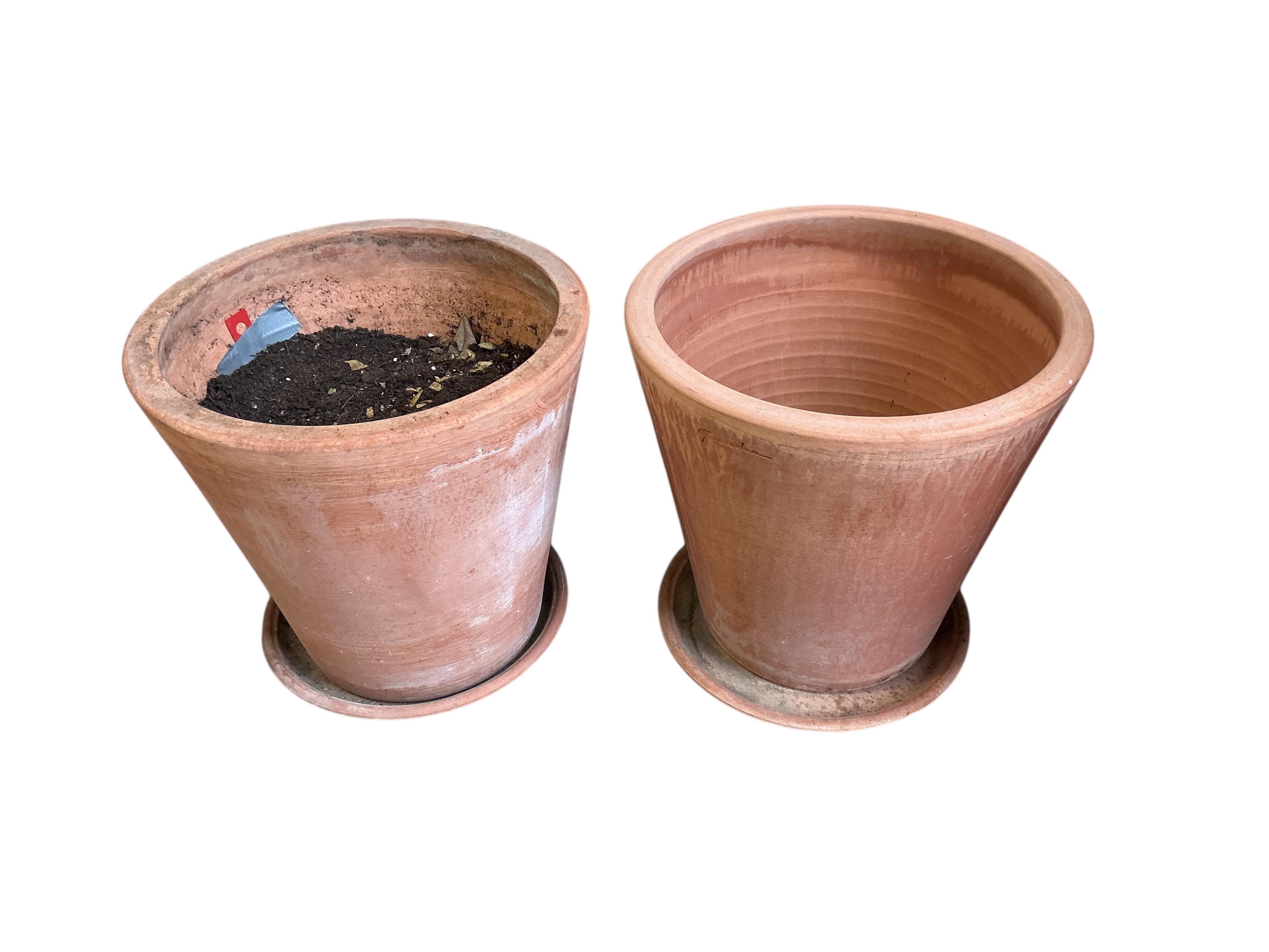 A pair of Goicoechea circular pottery planters with tray bases, diameter 39cm, height 38cm